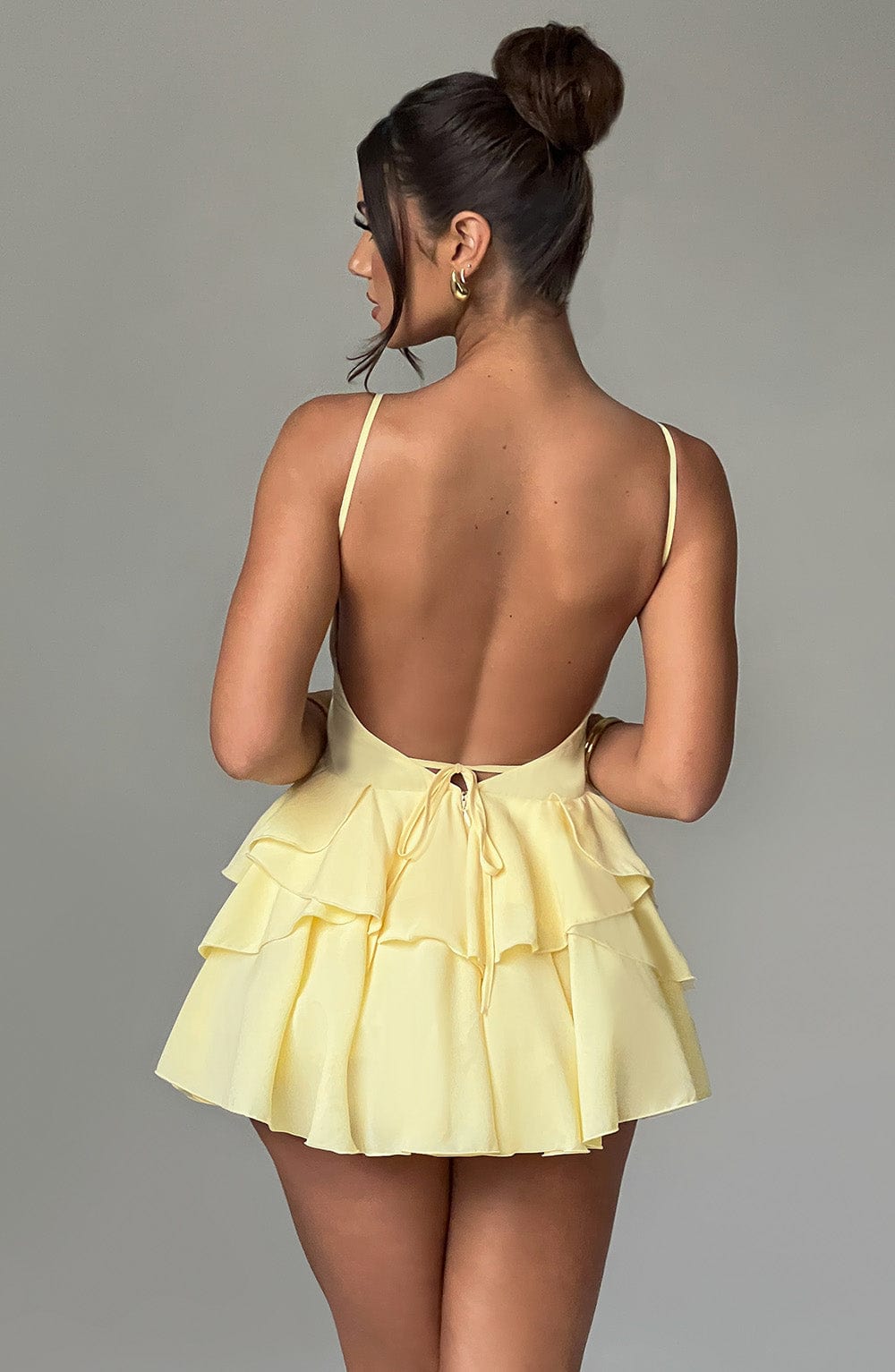 Lemon Chiffon Playsuit with Ruffle Skirt & Backless Design