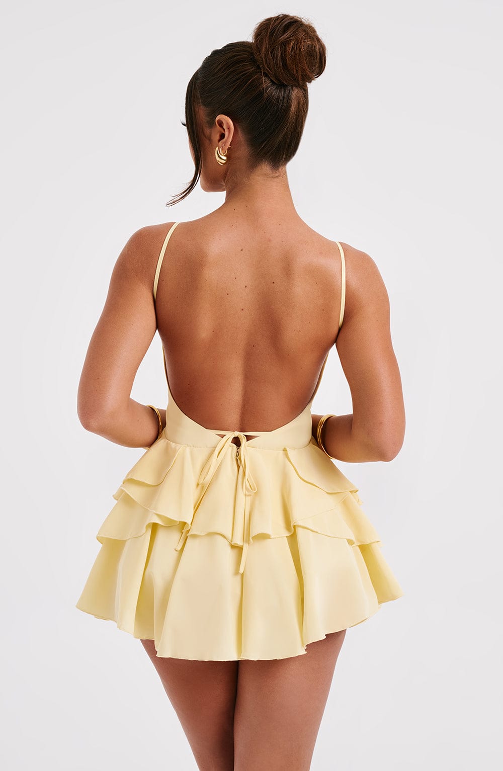 Lemon Chiffon Playsuit with Ruffle Skirt & Backless Design
