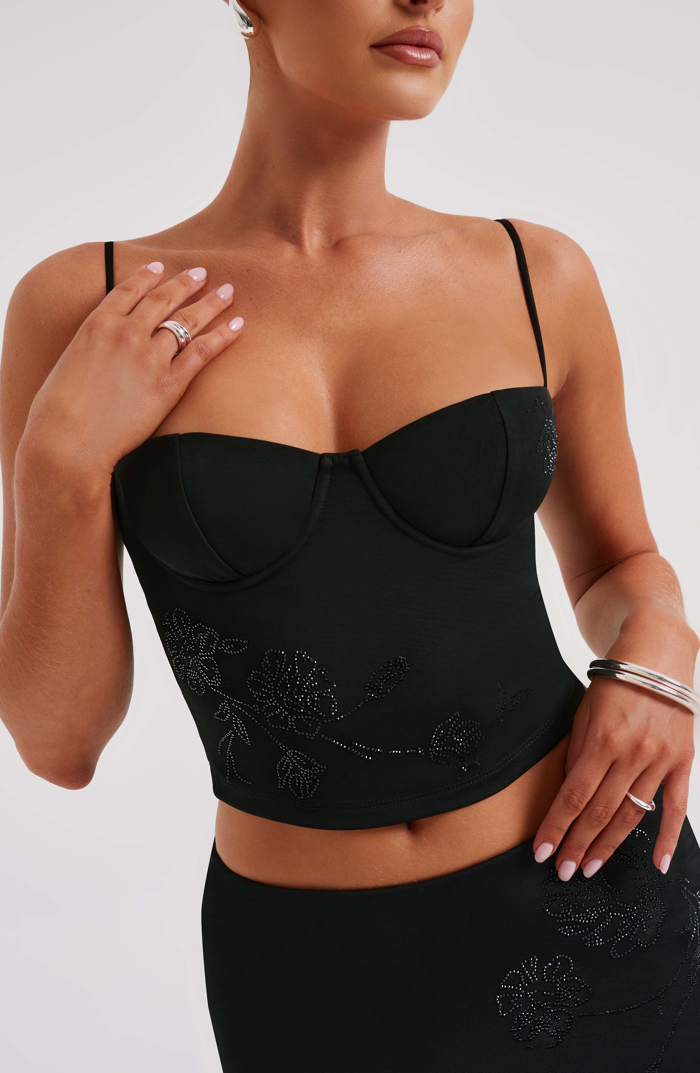 Izi Black Corset Top with Rhinestone Flower Detail