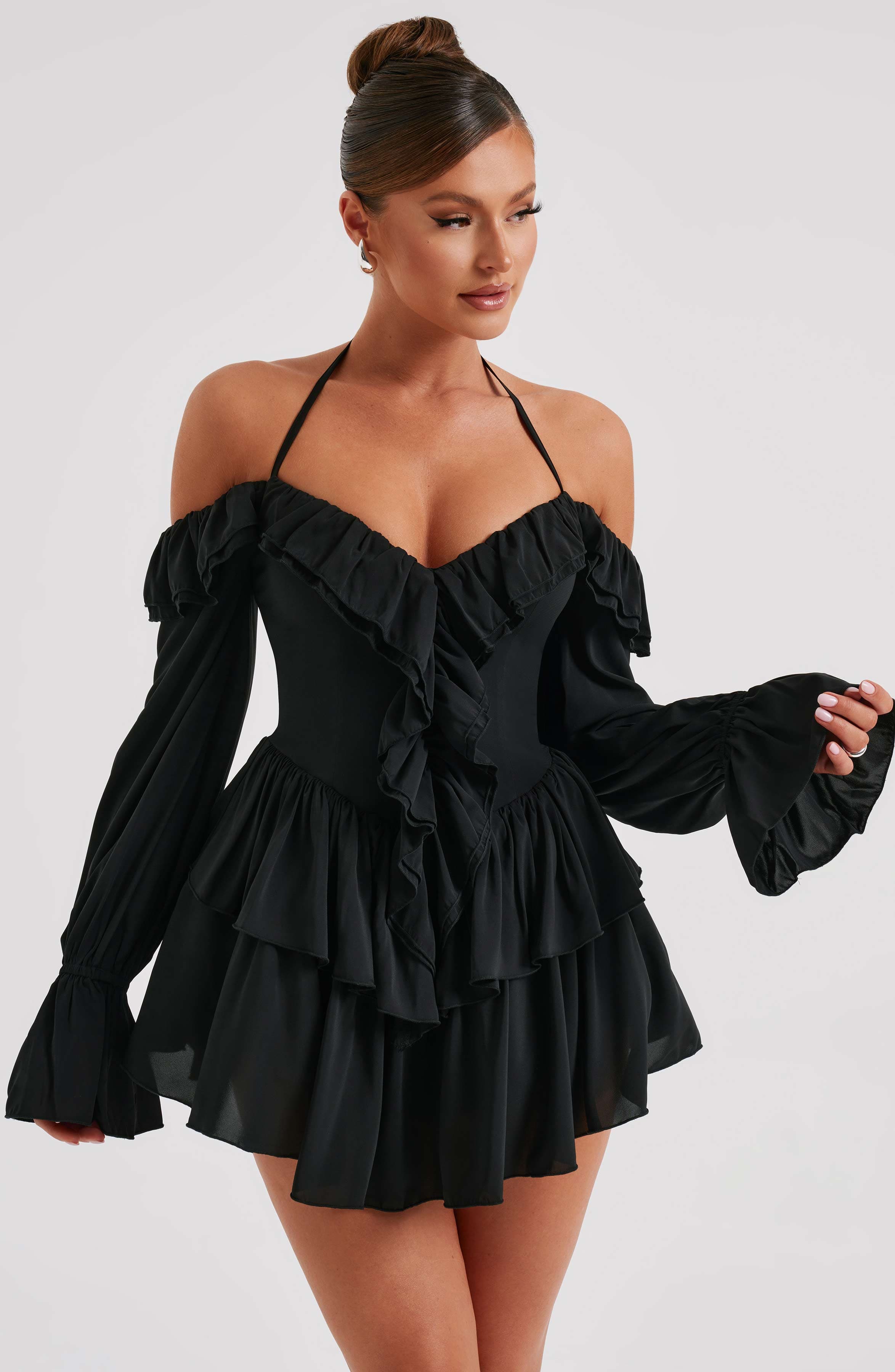 Black Savanna Playsuit with Ruffles & Off-Shoulder Design